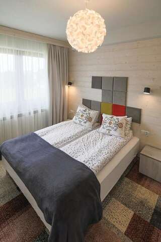 Отели типа «постель и завтрак» Villa Moje Tatry 2 Бялы-Дунаец Двухместный номер Делюкс с 1 кроватью-9